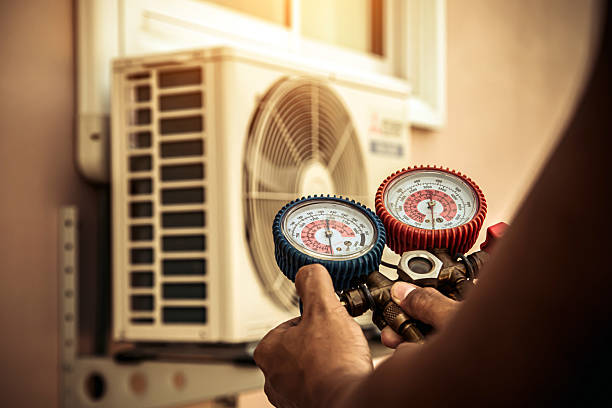 Professional Heat Pump Repair technician working in Hemphill, TX